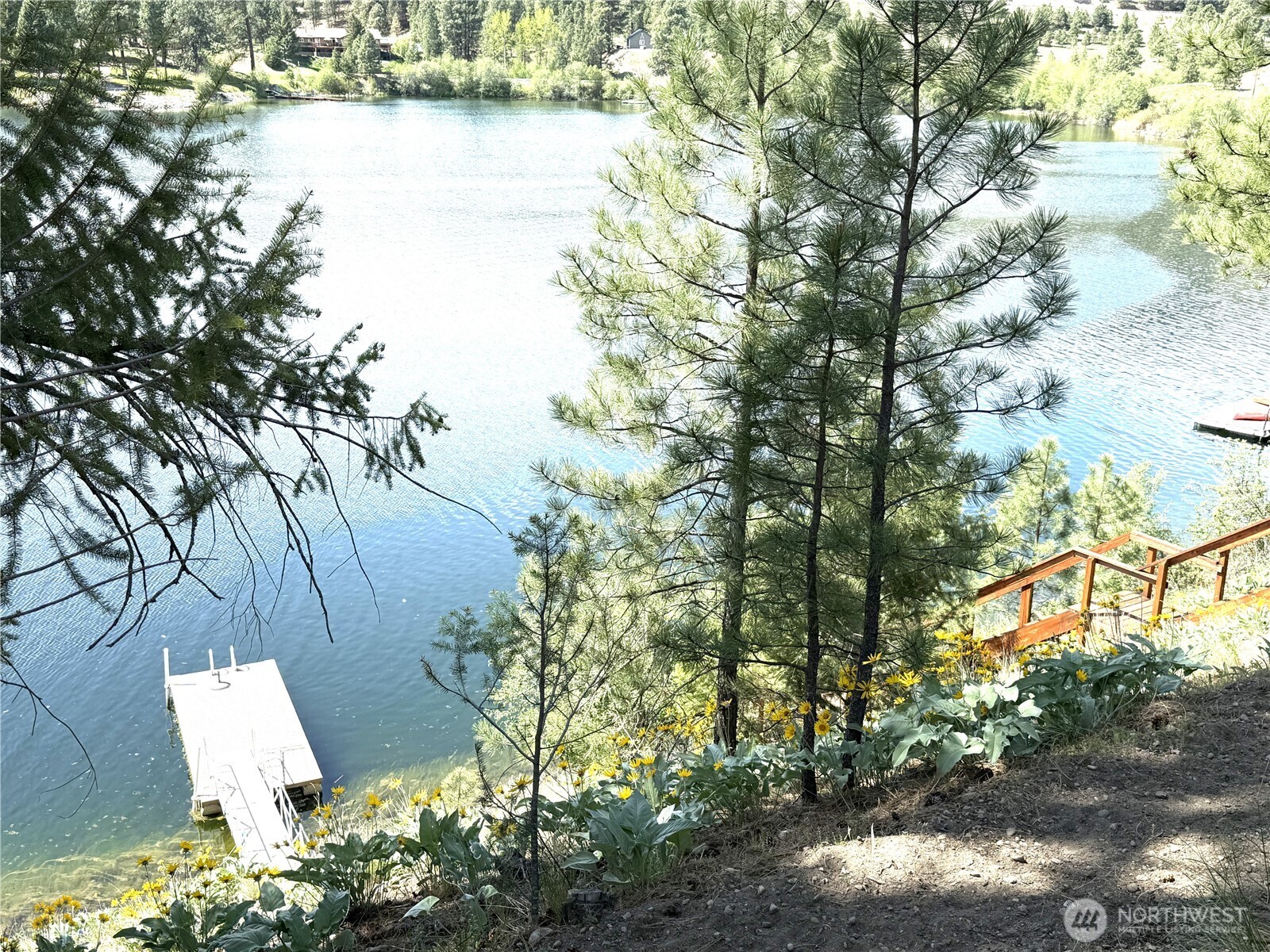 8 Julian Bay Road Republic, WA 99166 - Photo 36 of 40 a garden view with a lake