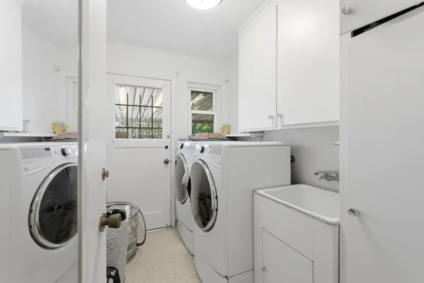 a utility room with dryer and washer