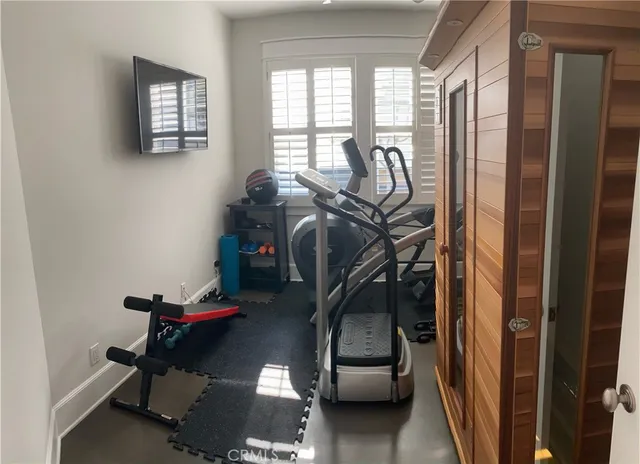 a view of a room with gym equipment