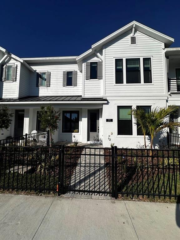 a front view of a house with a porch