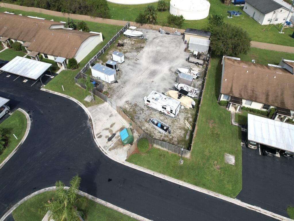 6022 Indrio Road, Unit 3 Fort Pierce, FL 34951 - Photo 34 of 35 an aerial view of a house