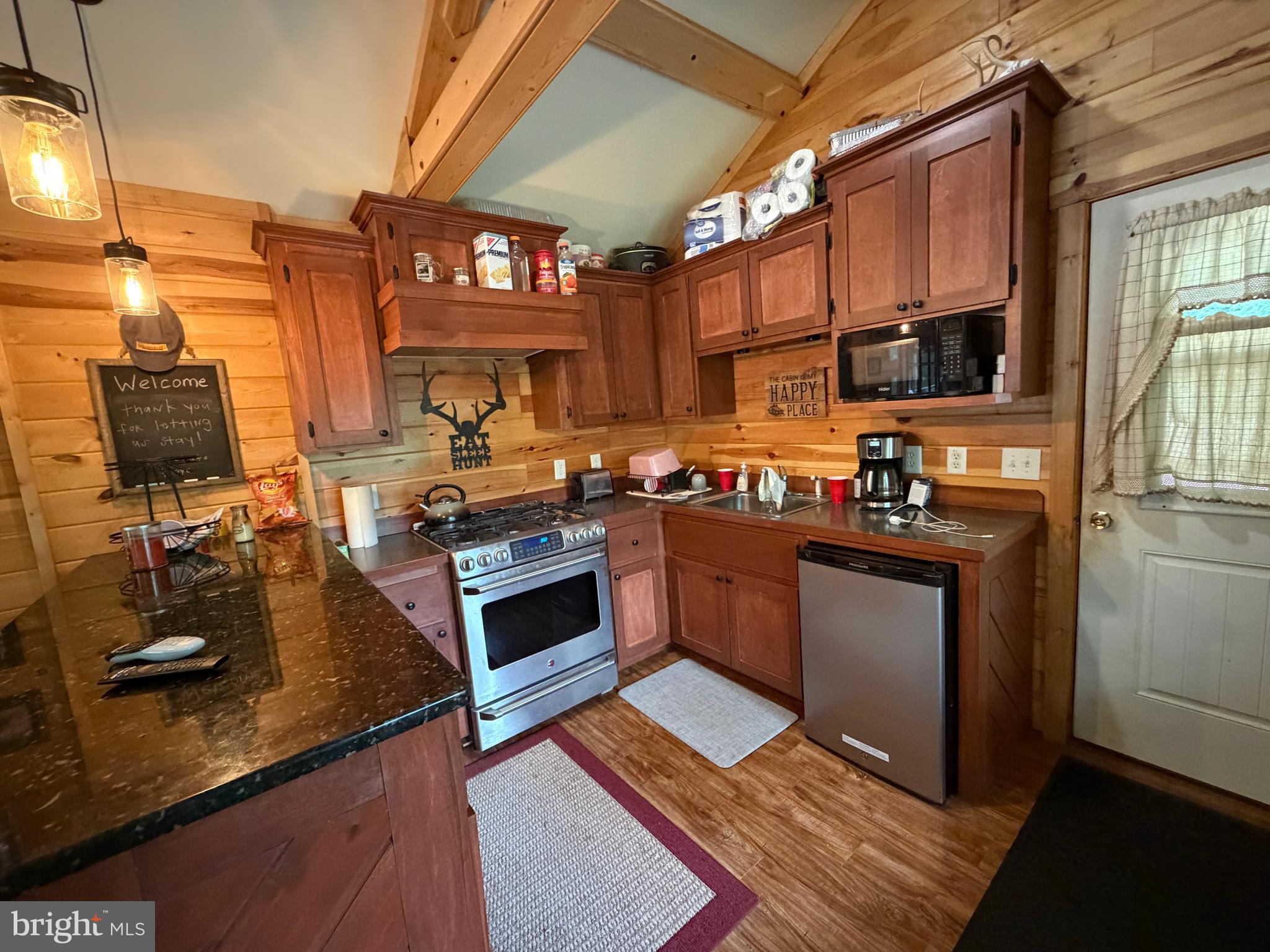 1419 Paul's Woods Road Delray, WV 26714 - Photo 21 of 105 a kitchen with granite countertop lots of counter top space and stainless steel appliances