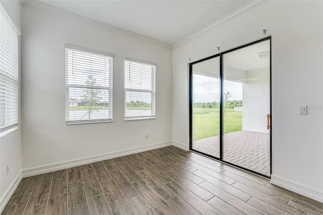 a view of an empty room and window