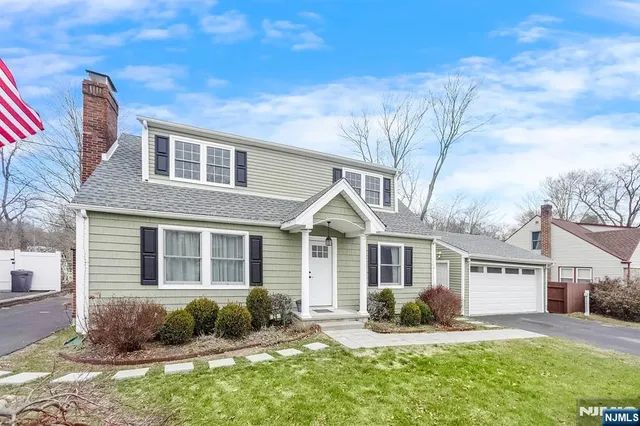 a house view with a garden space