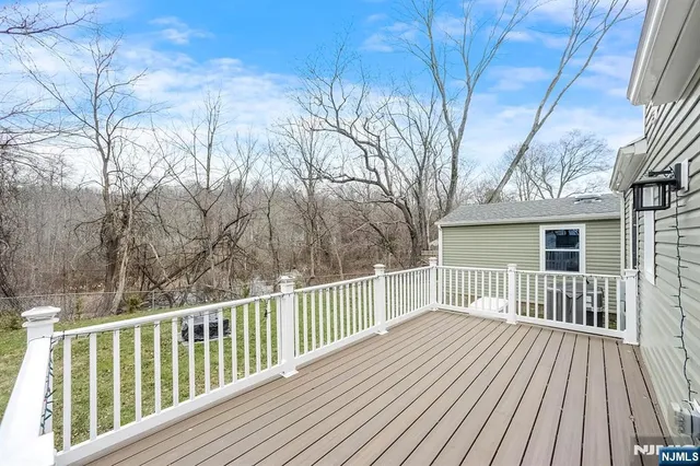 a view of a wooden roof deck