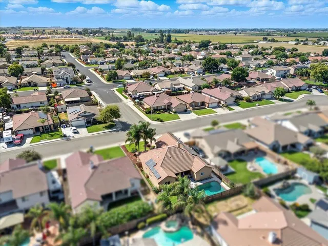 an aerial view of a city with lots of residential buildings