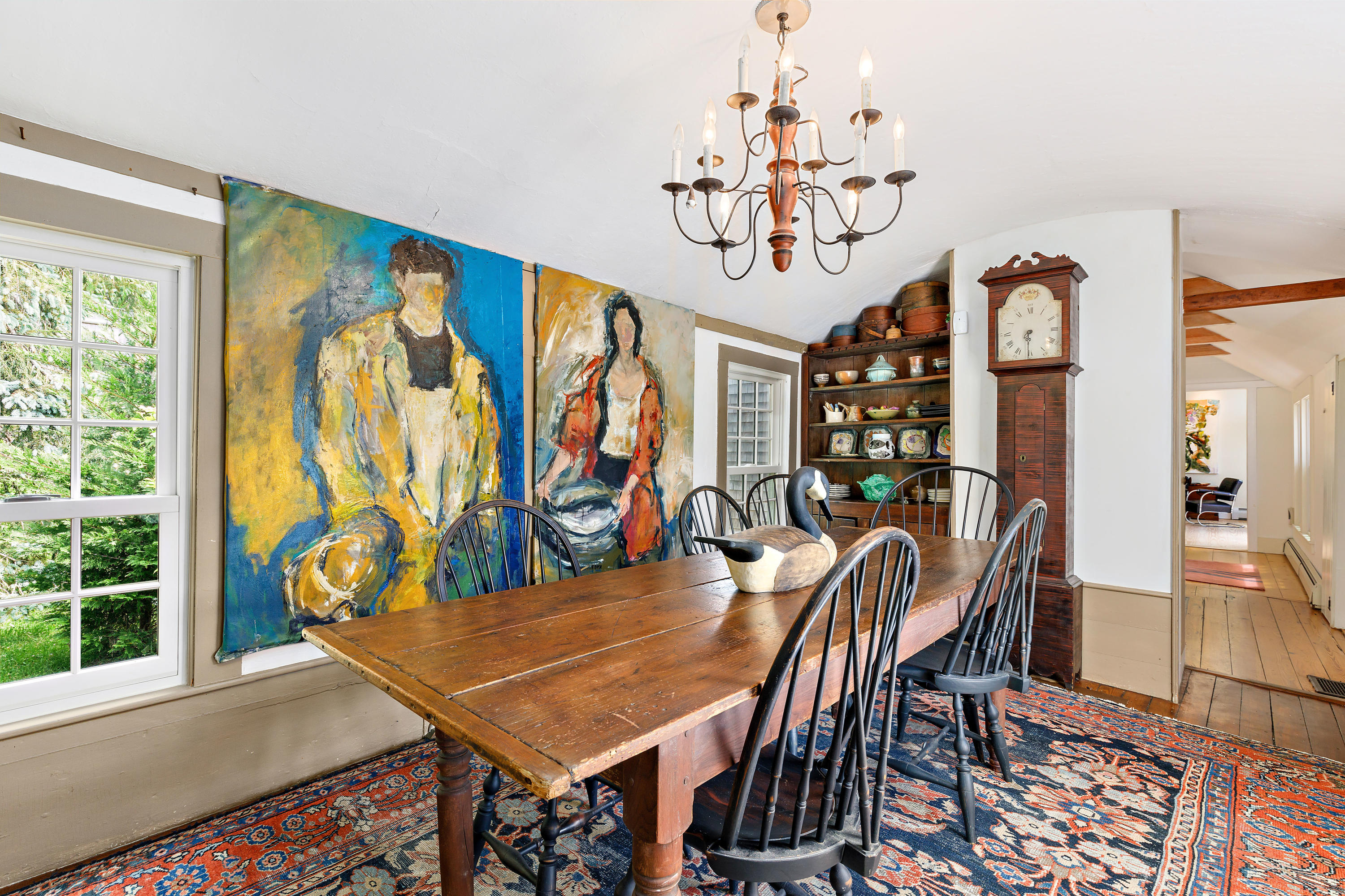 91 Castle Road Truro, MA 02666 - Photo 16 of 78 a view of a dining room with furniture wooden floor and chandelier