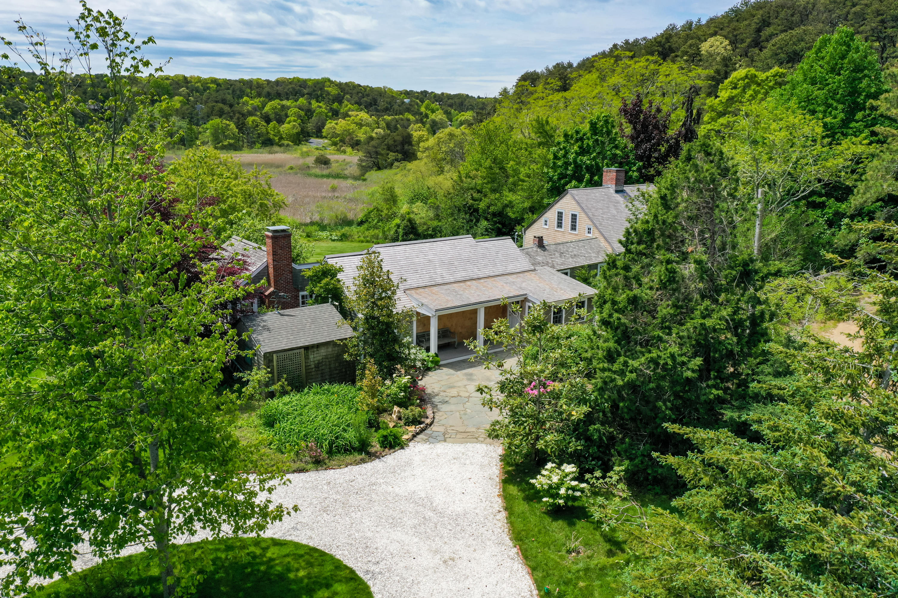 91 Castle Road Truro, MA 02666 - Photo 2 of 78 an aerial view of a house with yard and outdoor seating