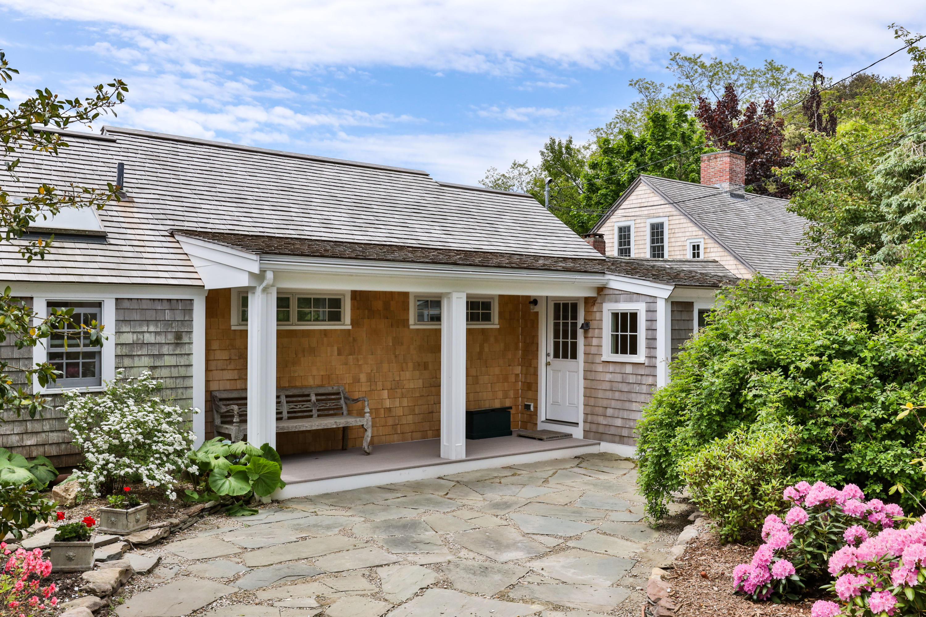 91 Castle Road Truro, MA 02666 - Photo 3 of 78 a front view of a house with a yard