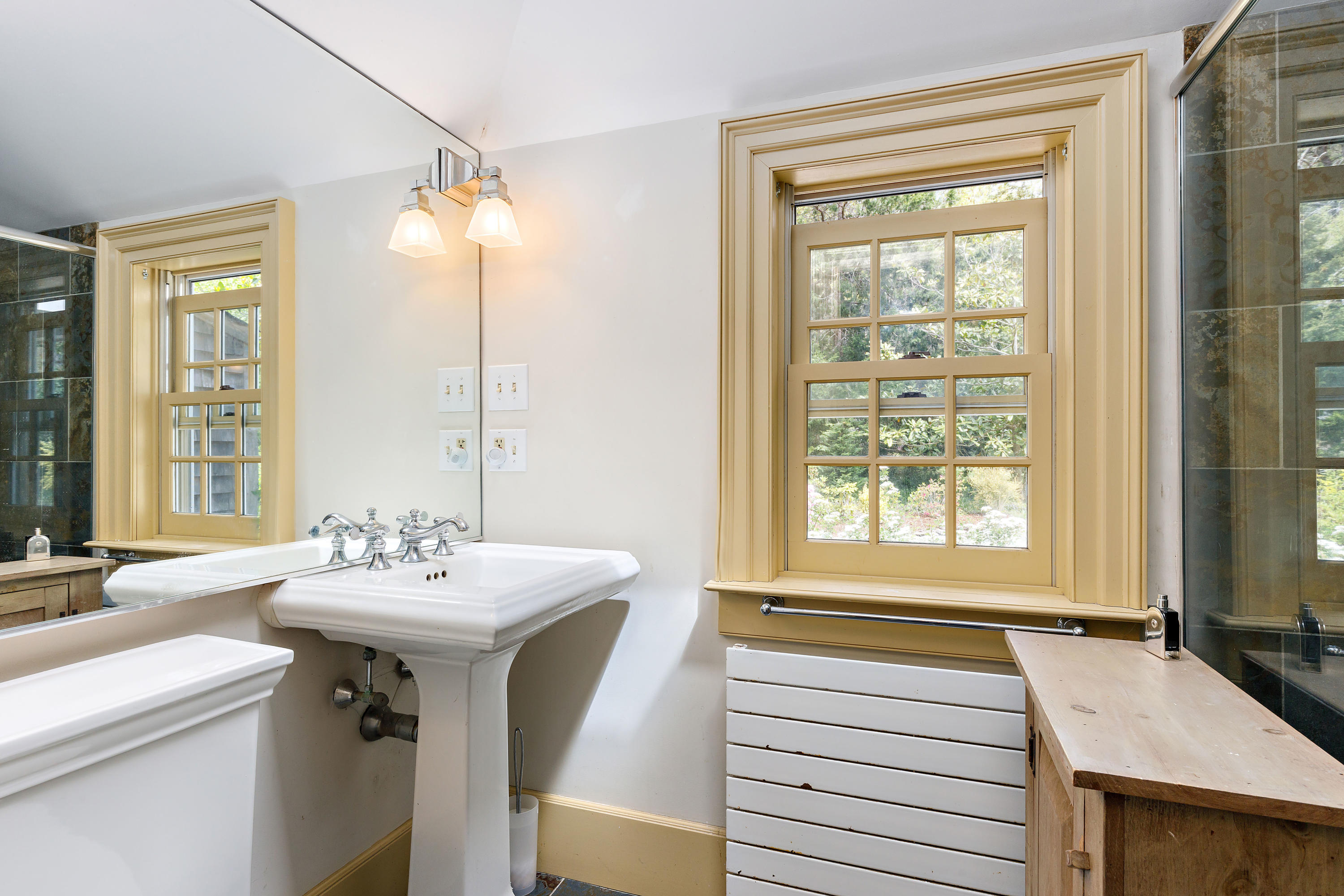 91 Castle Road Truro, MA 02666 - Photo 49 of 78 a bathroom with a sink and a mirror