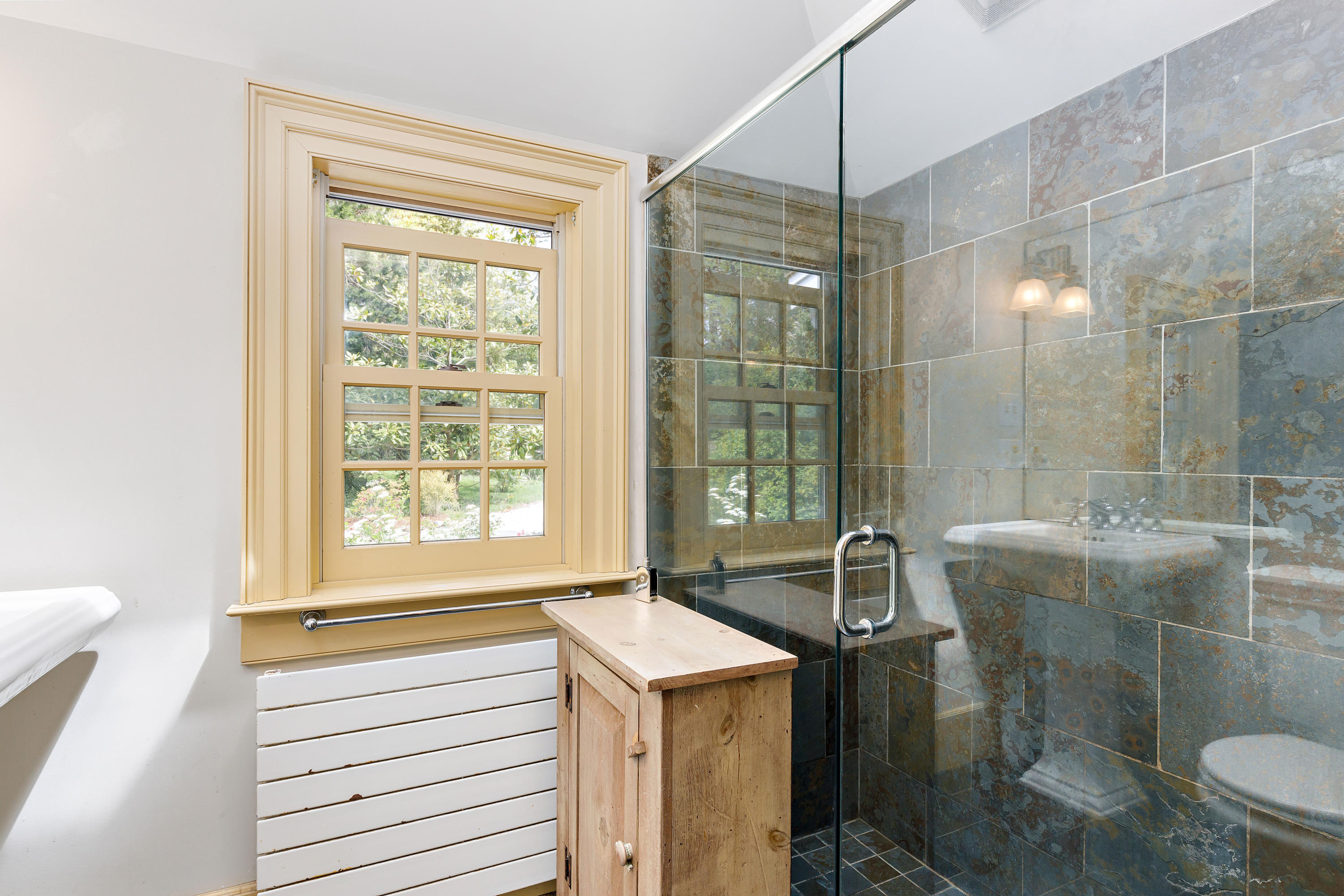 91 Castle Road Truro, MA 02666 - Photo 50 of 78 a bathroom with a granite countertop sink a toilet and shower
