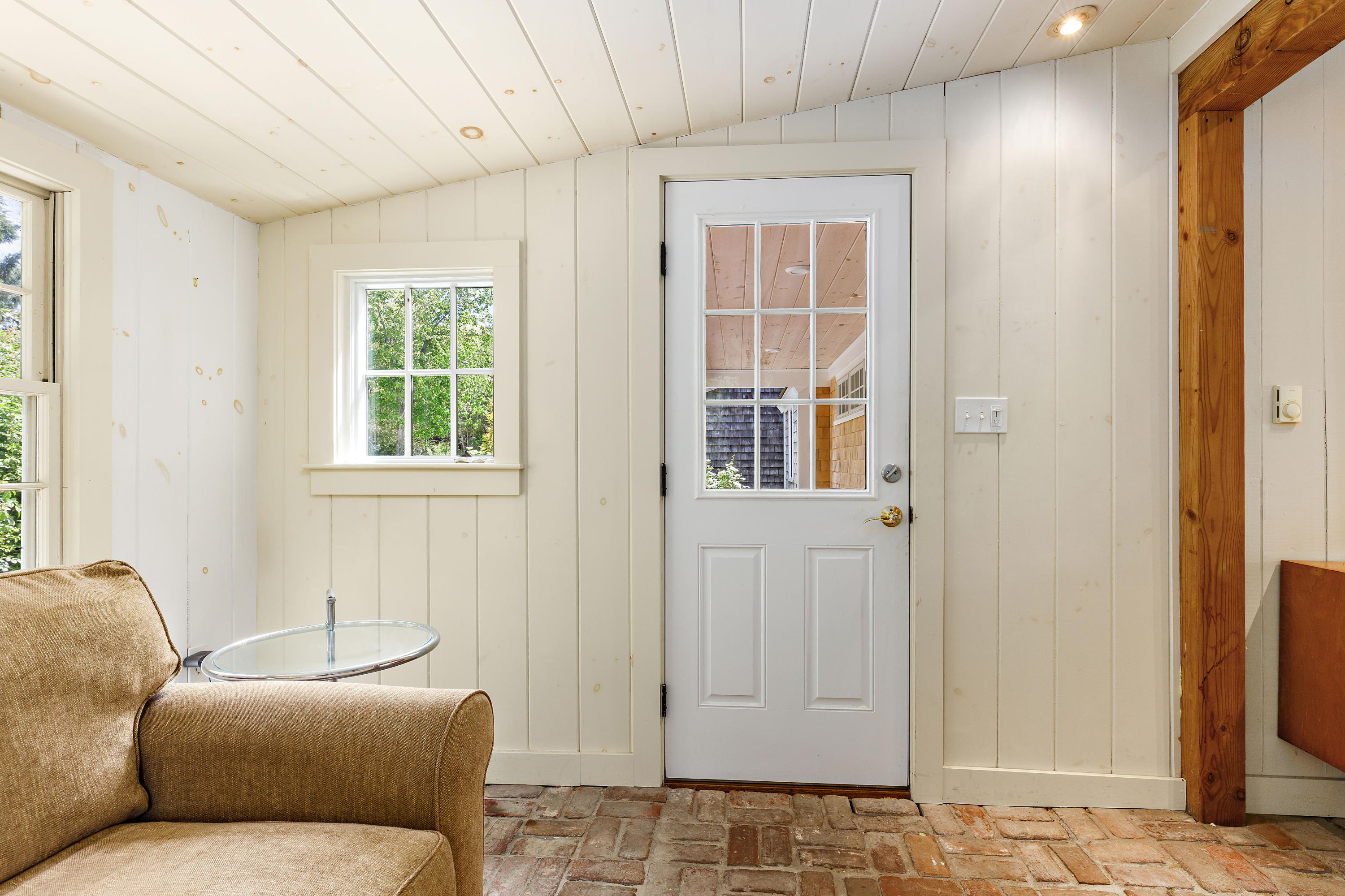 91 Castle Road Truro, MA 02666 - Photo 5 of 78 a living room with furniture and a window