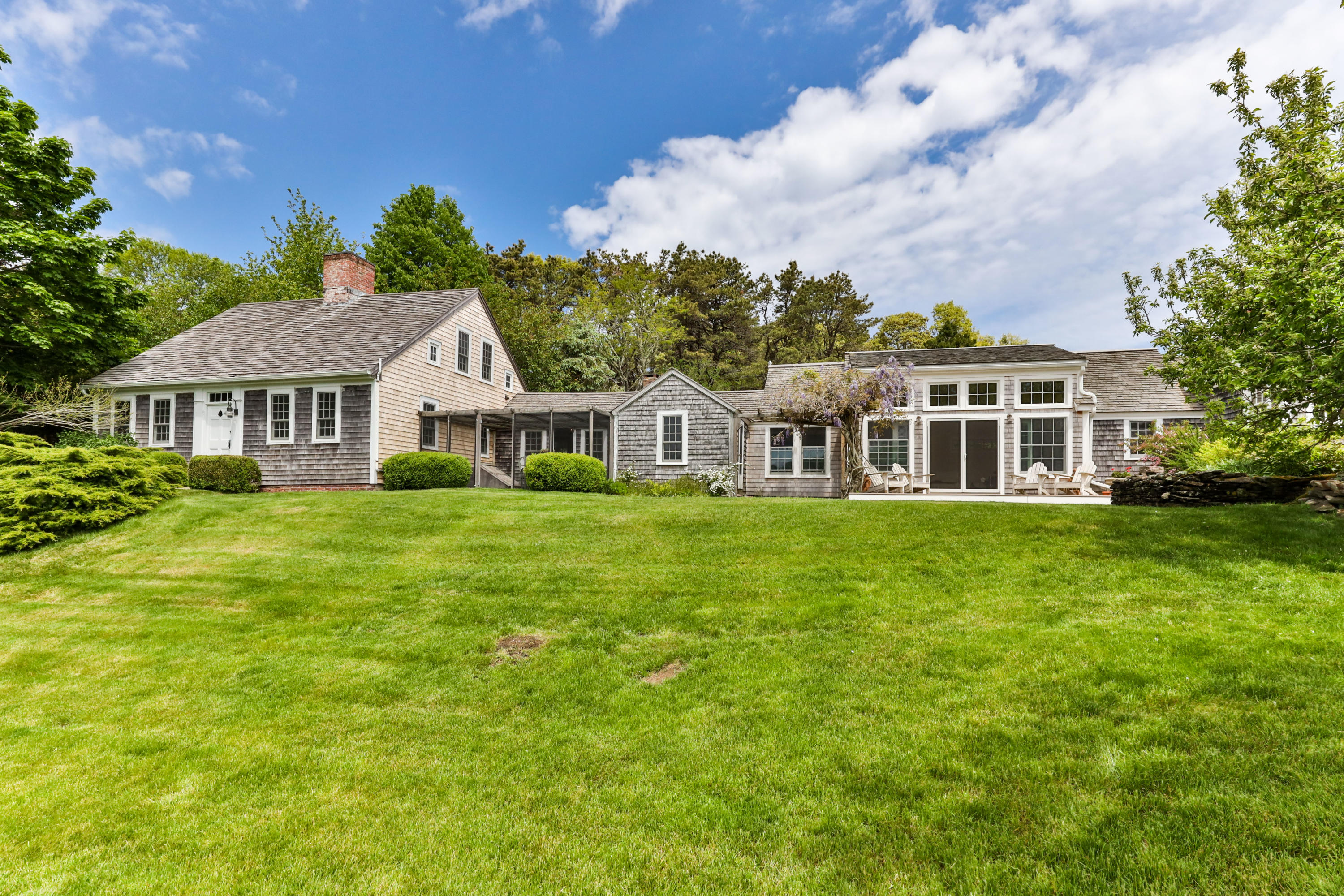 91 Castle Road Truro, MA 02666 - Photo 55 of 78 a view of a house with a big yard