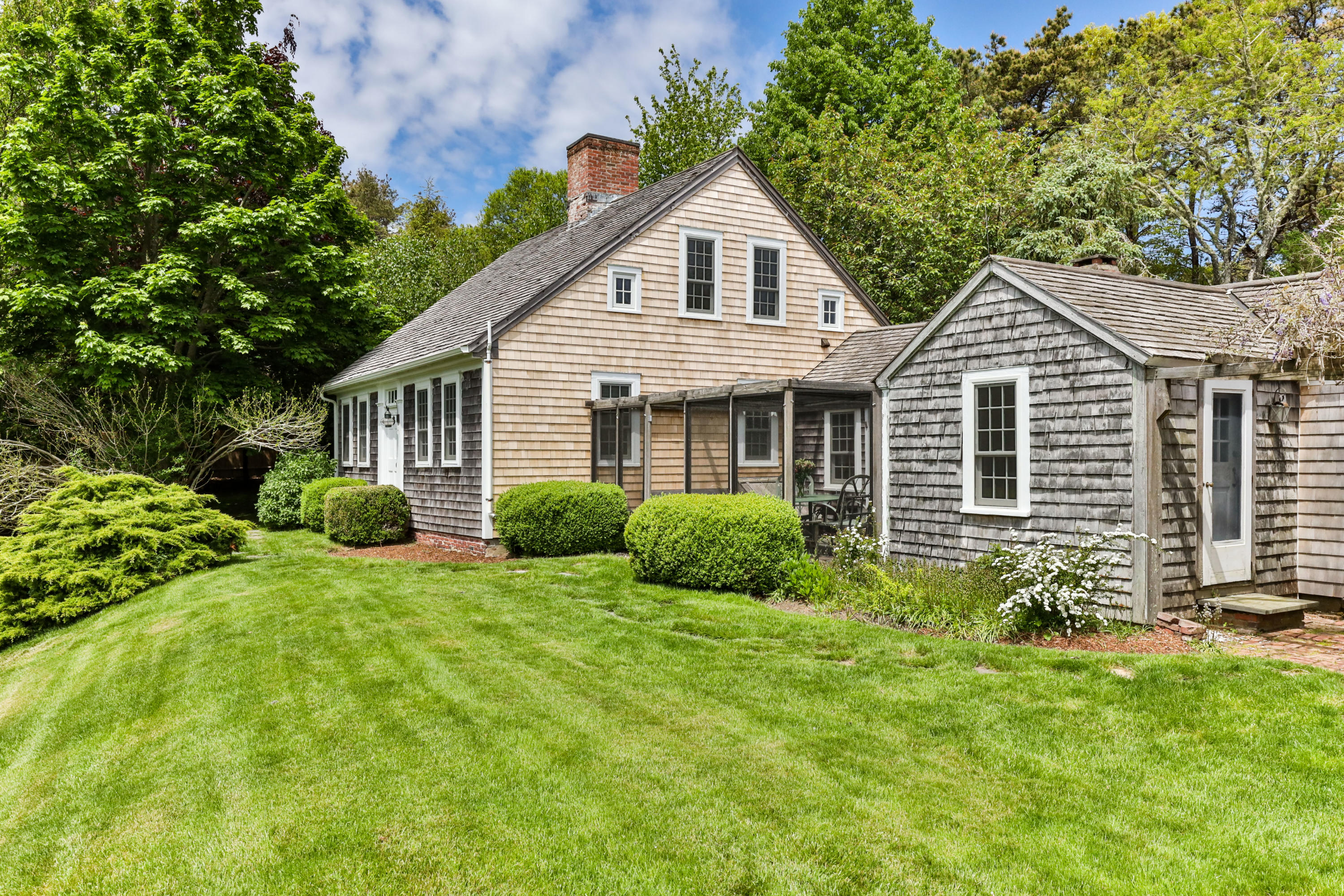 91 Castle Road Truro, MA 02666 - Photo 57 of 78 a view of a house with backyard and garden