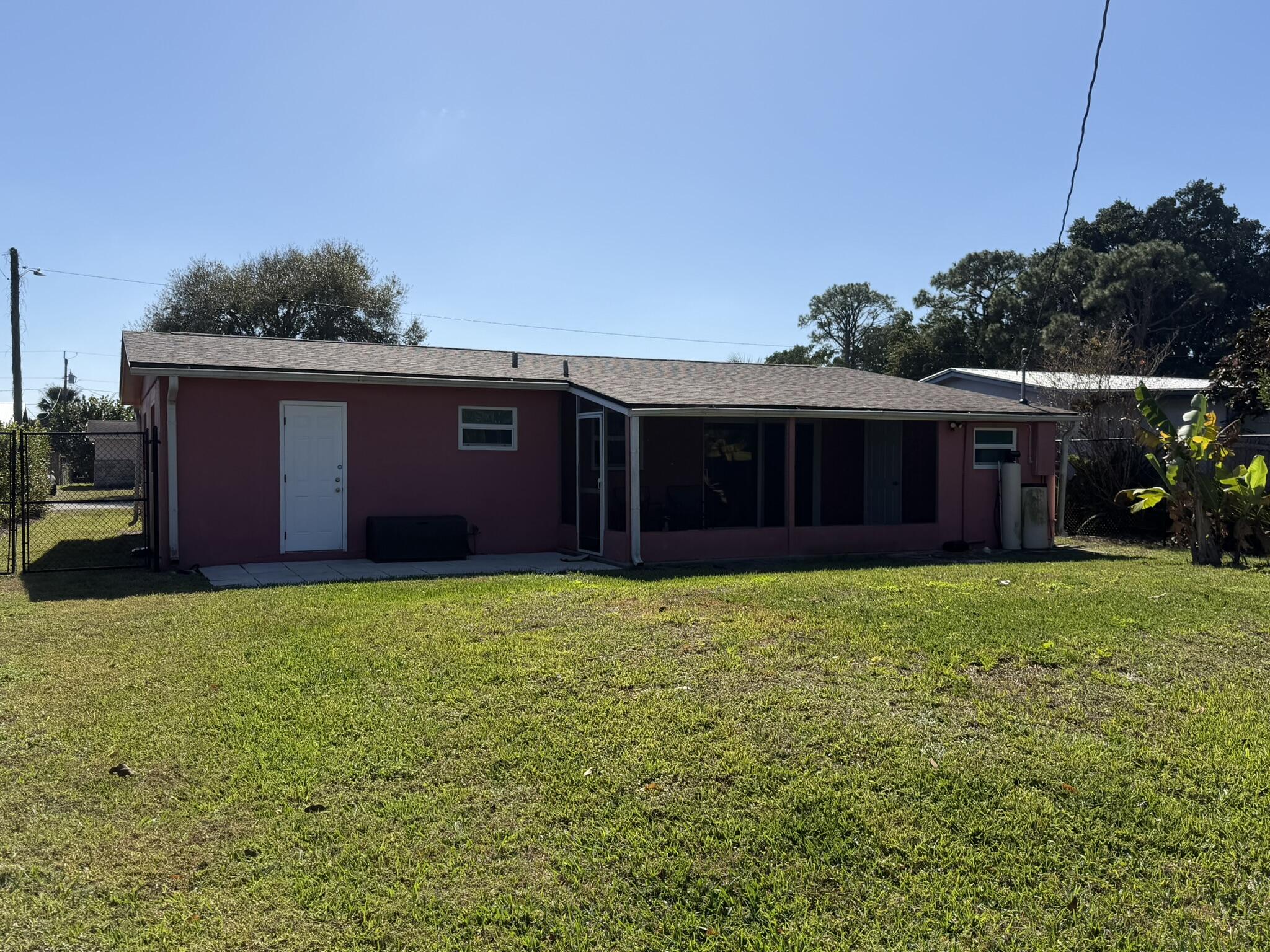 2399 Southeast Madison Street Stuart, FL 34997 - Photo 28 of 30 Rear Exterior