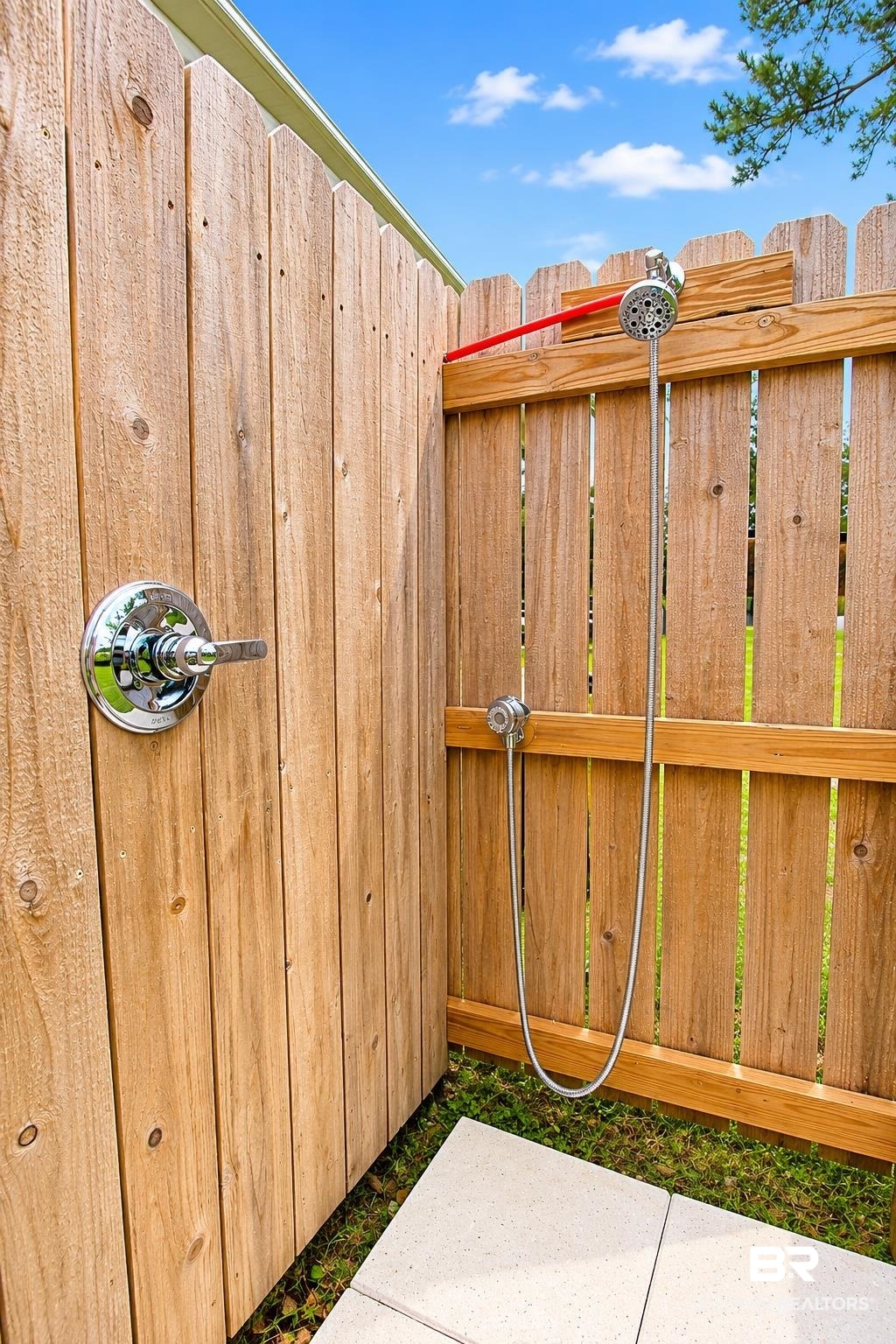 9825 Wolf Creek Ridge Elberta, AL 36530 - Photo 59 of 76 Outdoor shower enclosure featuring natural wood fencing and a chrome shower fixture