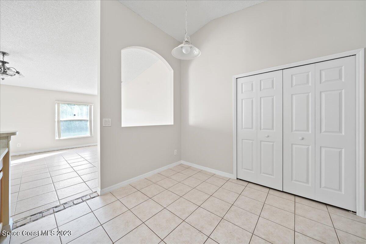 590 Fountain Street Southwest Palm Bay, FL 32908 - Photo 15 of 40 a view of an empty room and window