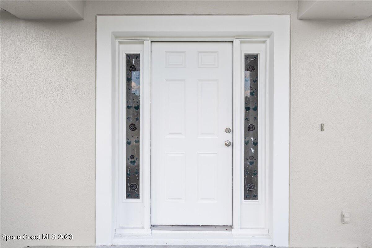 590 Fountain Street Southwest Palm Bay, FL 32908 - Photo 3 of 40 a view of a front door