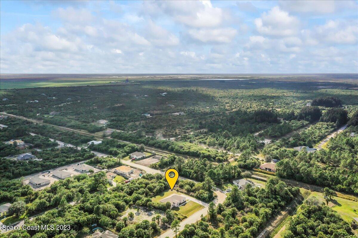 590 Fountain Street Southwest Palm Bay, FL 32908 - Photo 34 of 40 a view of a lake with lots of green space