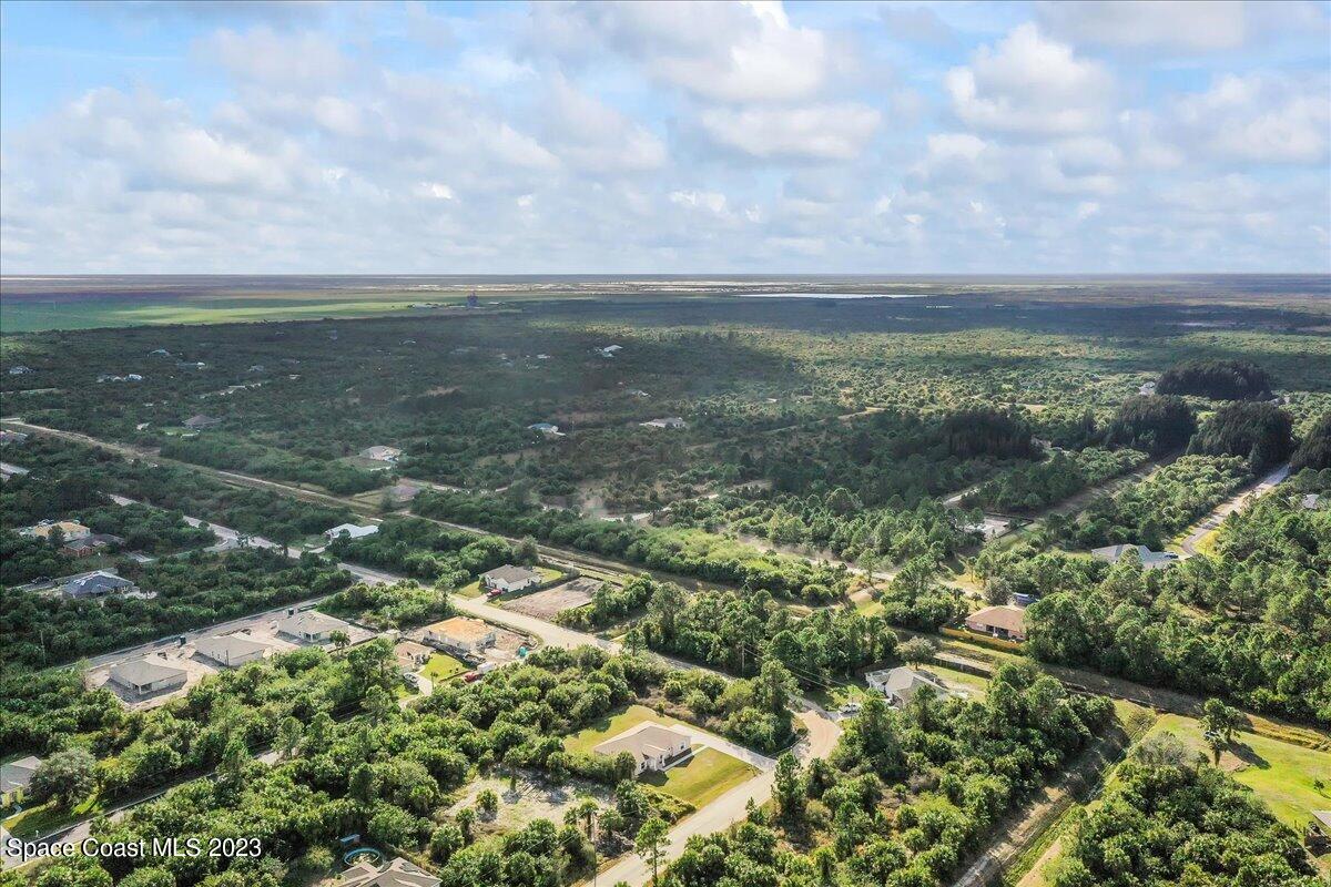 590 Fountain Street Southwest Palm Bay, FL 32908 - Photo 36 of 40 a view of a lake with lots of green space