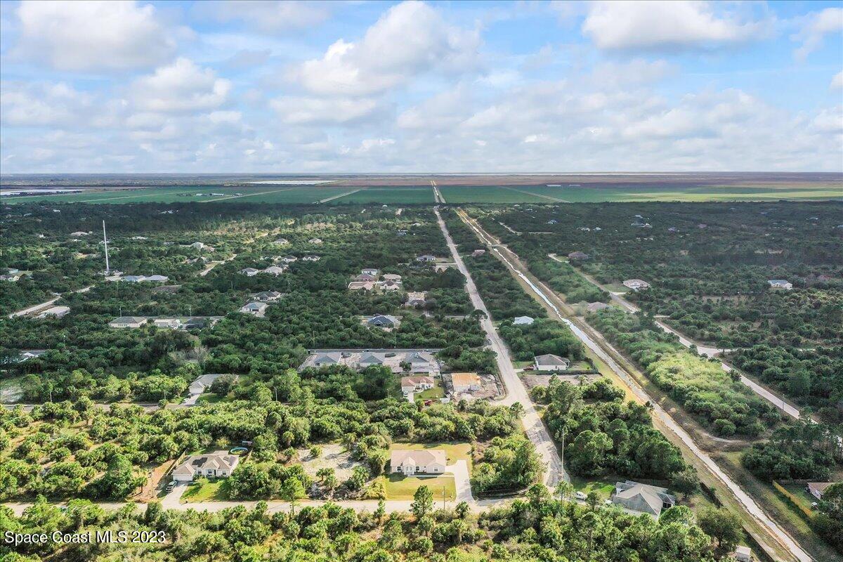 590 Fountain Street Southwest Palm Bay, FL 32908 - Photo 37 of 40 a view of a lake with a city