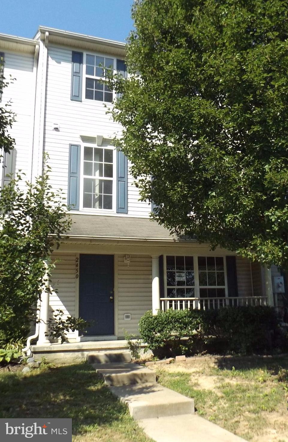 2450 Beaver Crossing Road Edgewood, MD 21040 - Photo 1 of 18 a front view of a house with a yard and garage