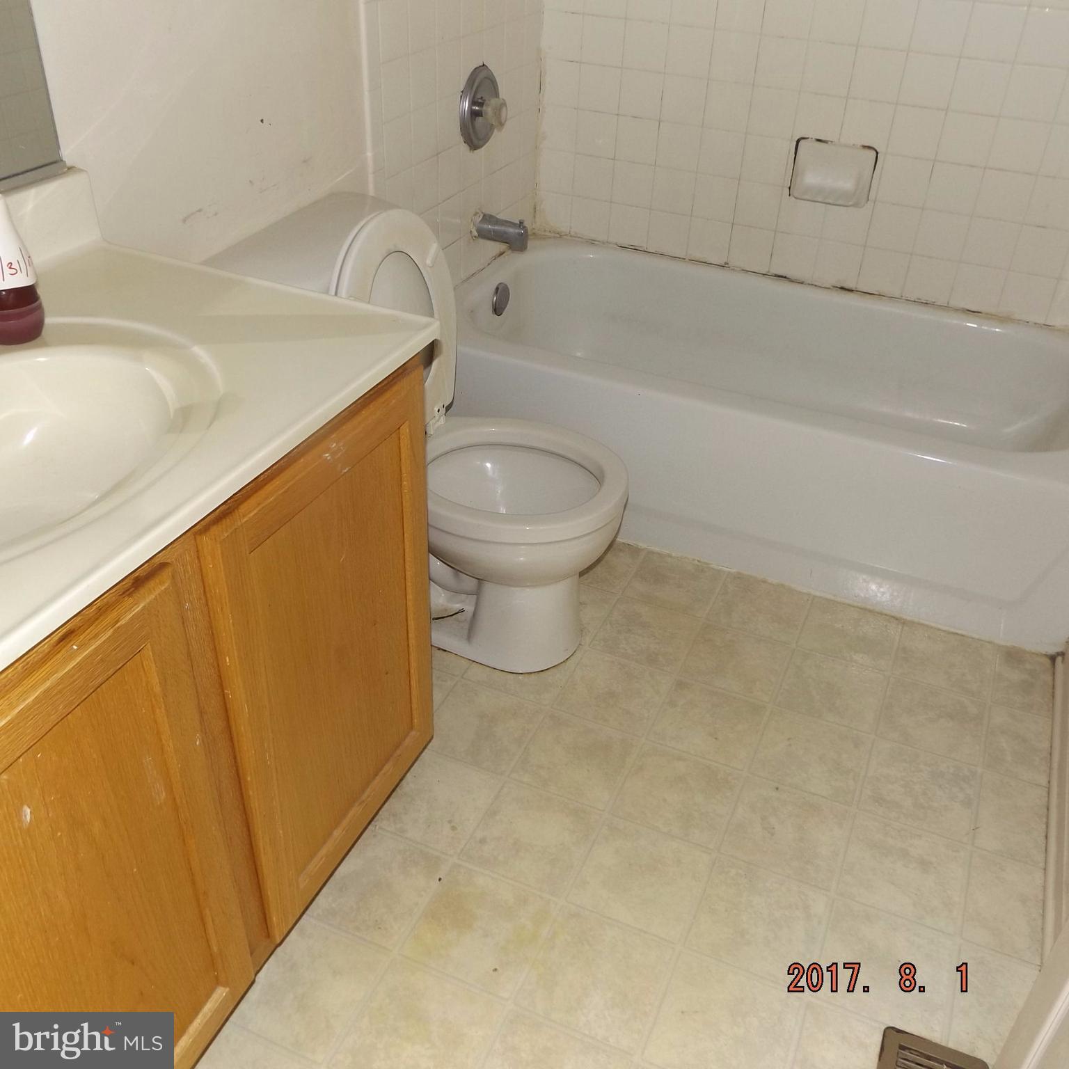 2450 Beaver Crossing Road Edgewood, MD 21040 - Photo 12 of 18 a bathroom with a bathtub and toilet