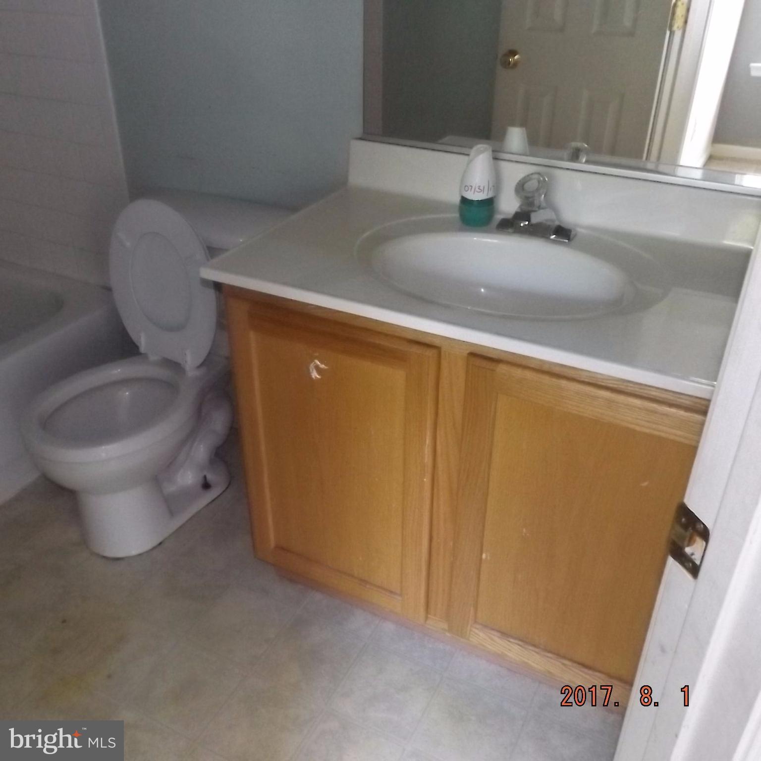 2450 Beaver Crossing Road Edgewood, MD 21040 - Photo 16 of 18 a bathroom with a toilet and a sink