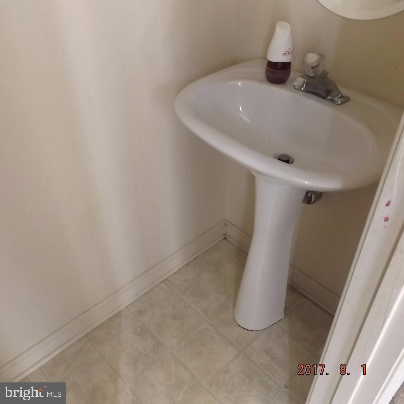 2450 Beaver Crossing Road Edgewood, MD 21040 - Photo 7 of 18 a bathroom with a sink