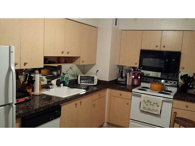 9195 Collins Avenue, Unit 711 Surfside, FL 33154 - Photo 16 of 18 Kitchen