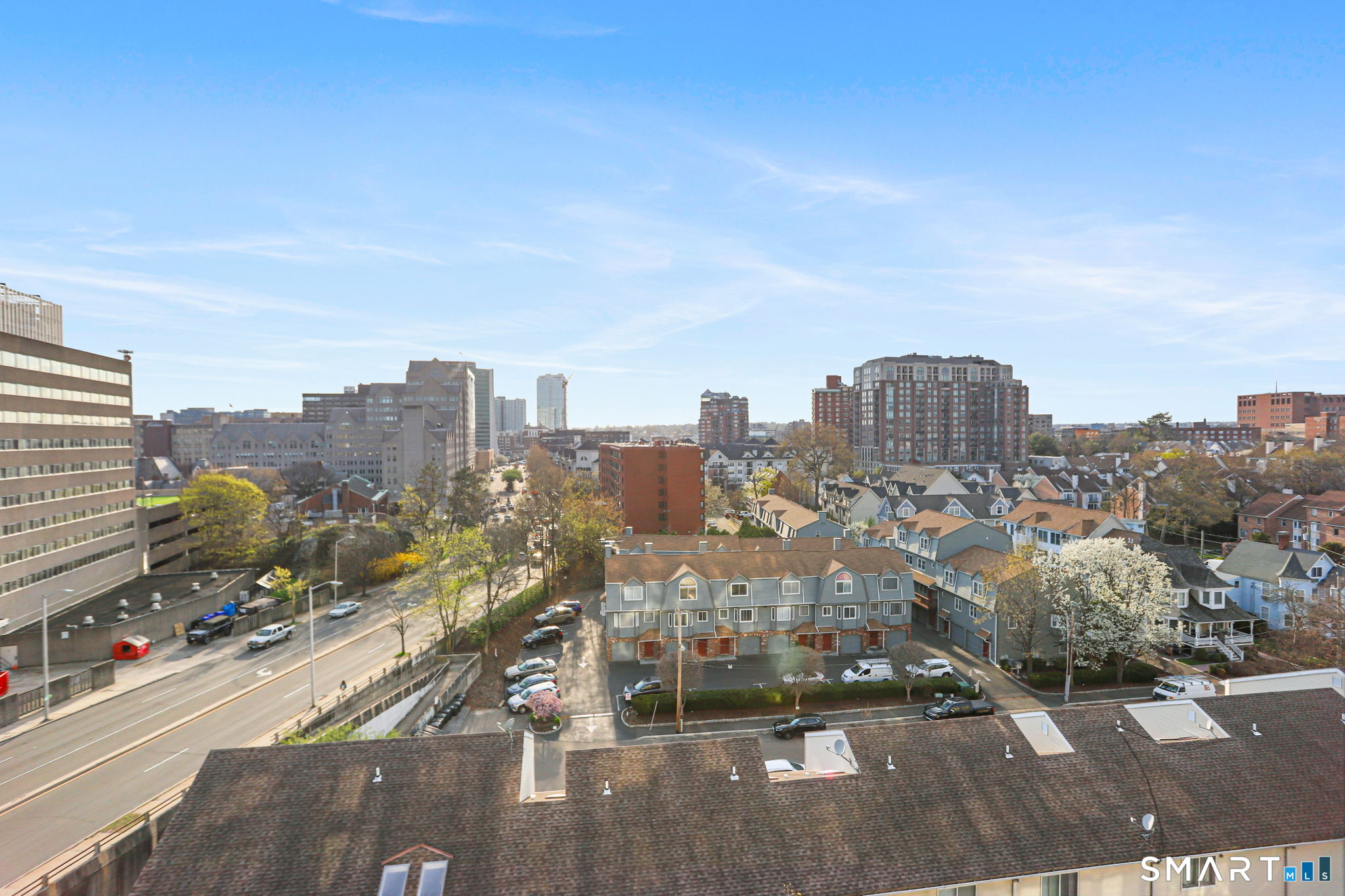 300 Broad Street, Unit 603 Stamford, CT 06901 - Photo 19 of 20 a view of a city with tall buildings