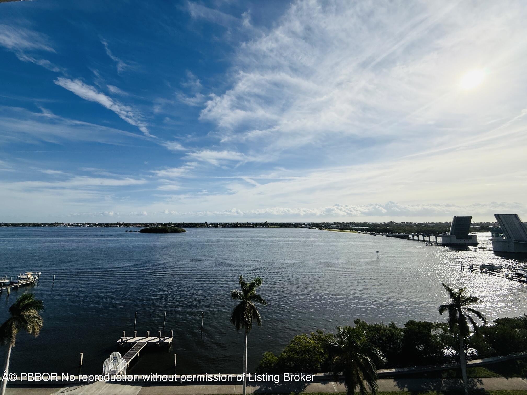 3800 Washington Road, Unit 907 West Palm Beach, FL 33405 - Photo 5 of 8 a view of a lake next to a lake
