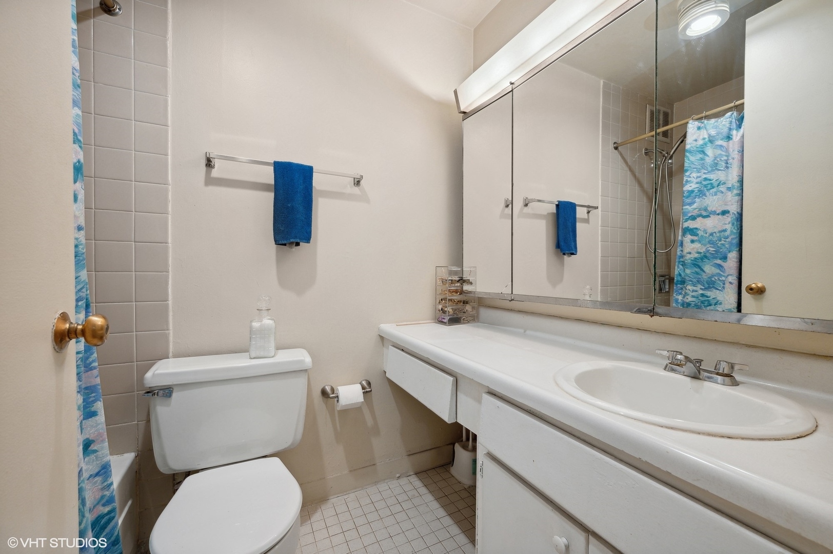 1 East Scott Street, Unit 601 Chicago, IL 60610 - Photo 11 of 15 a bathroom with a sink toilet and mirror
