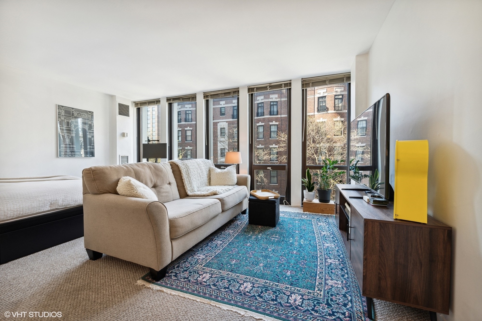 1 East Scott Street, Unit 601 Chicago, IL 60610 - Photo 5 of 15 a living room with furniture and a window