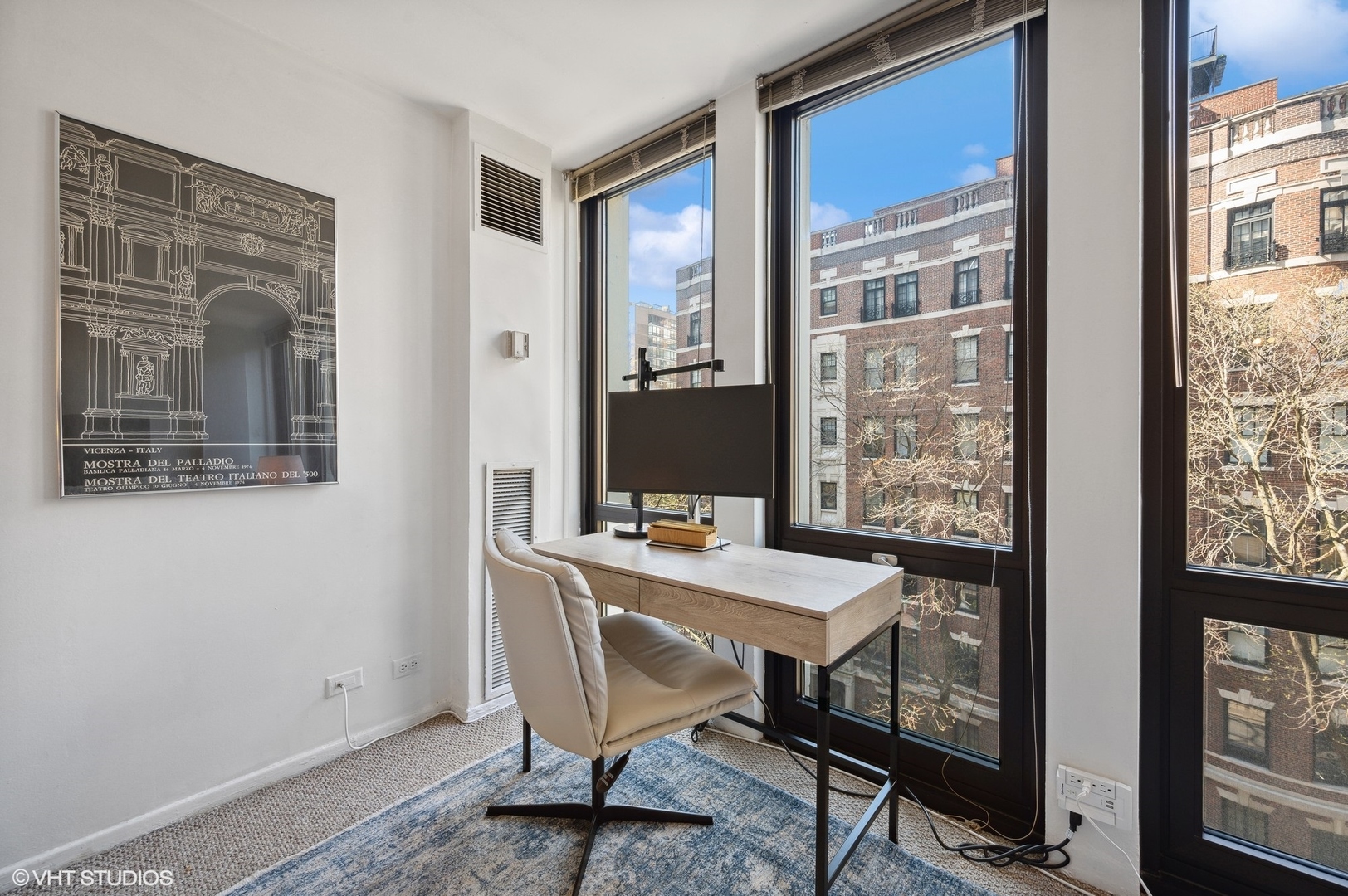 1 East Scott Street, Unit 601 Chicago, IL 60610 - Photo 6 of 15 a view of a workspace with furniture