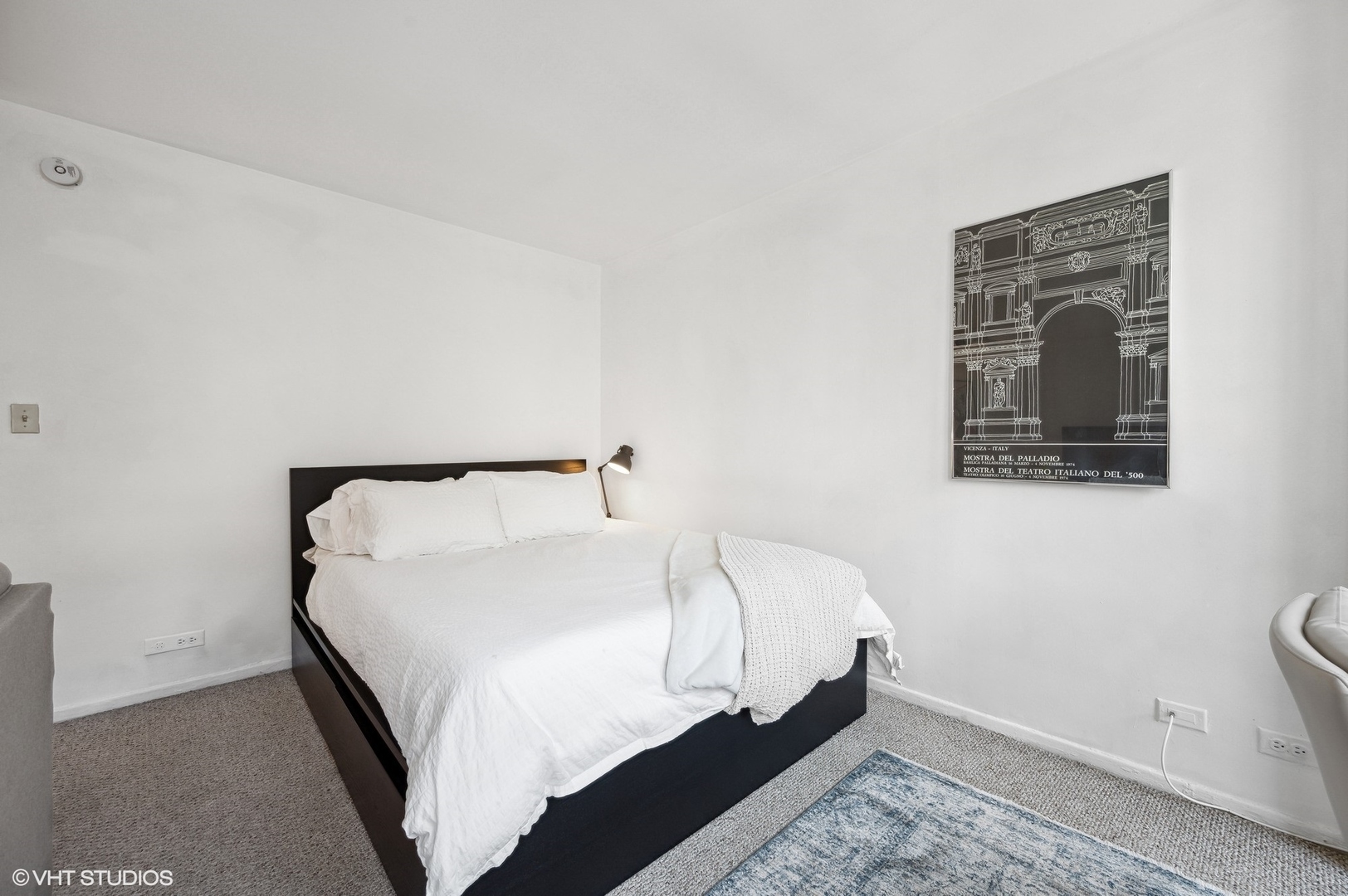 1 East Scott Street, Unit 601 Chicago, IL 60610 - Photo 9 of 15 a bedroom with a bed and a night stand