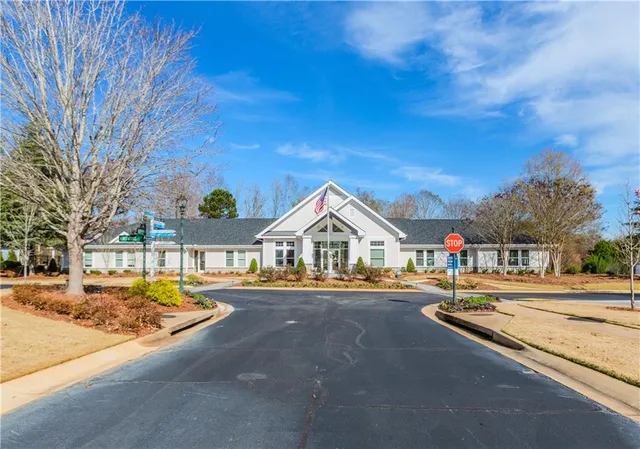 a house with garden in front of it