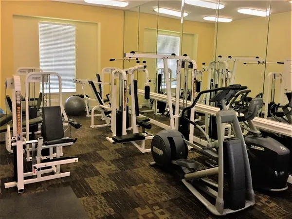 a view of a room with gym equipment