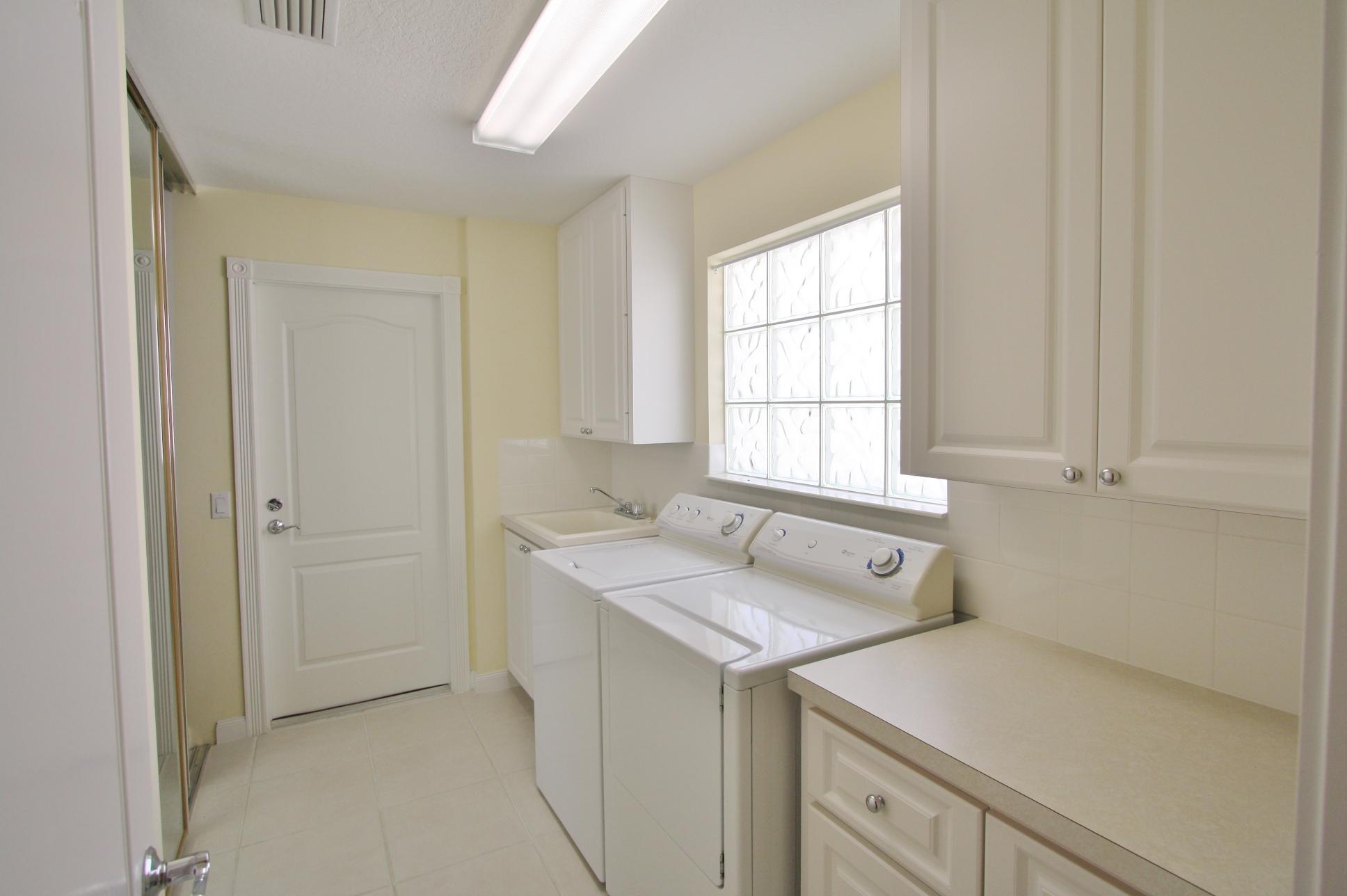 1069 Southwest Balmoral Trace Stuart, FL 34997 - Photo 12 of 18 Laundry Room