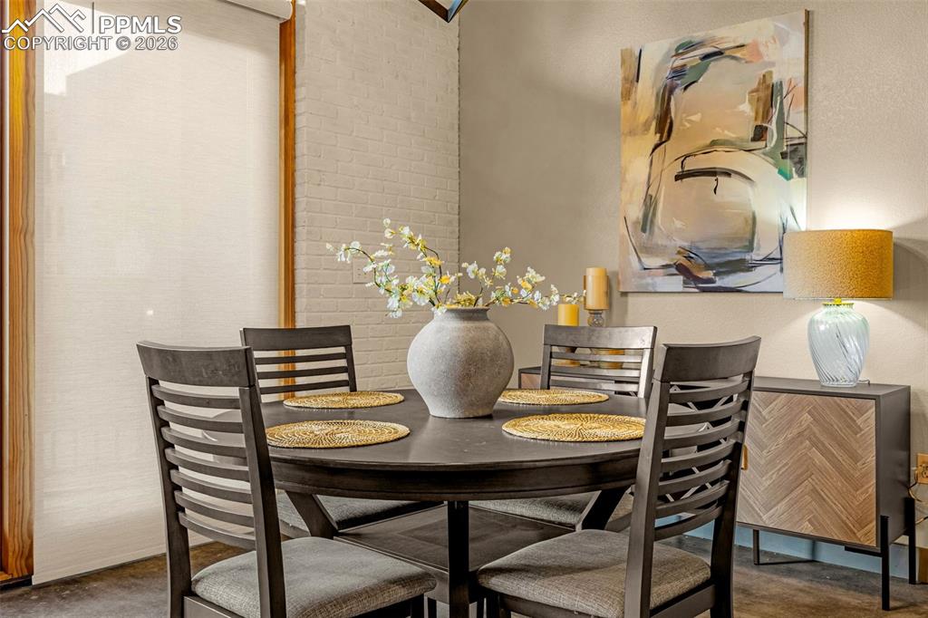 101 North Tejon Street, Unit 280 Colorado Springs, CO 80903 - Photo 10 of 32 a view of a dining room with furniture