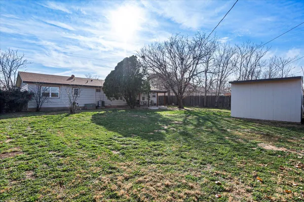 a view of a backyard with a garden