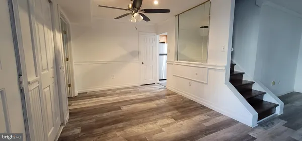 a view of a hallway view with staircase
