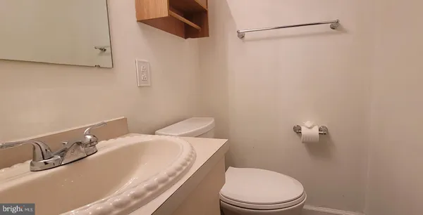 a bathroom with a sink and a toilet