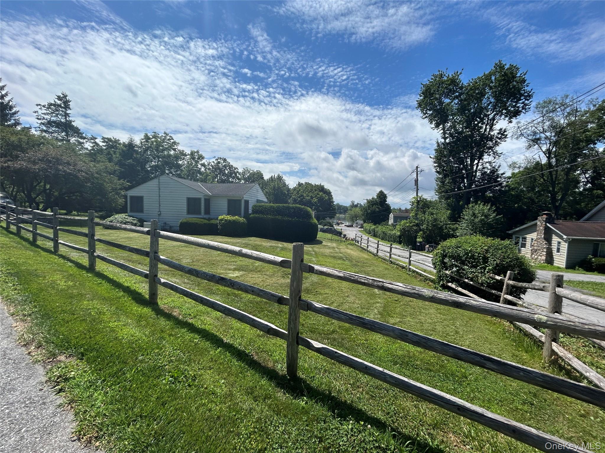 10 Huron Road Carmel, NY 10512 - Photo 1 of 1 a view of a terrace with wooden fence