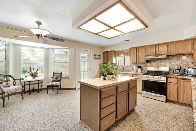 a kitchen with counter and workspace