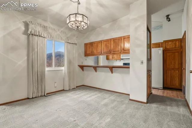 a view of a room with an empty space