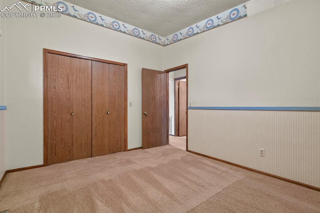 1122 Fontmore Road, Unit C Colorado Springs, CO 80904 - Photo 22 of 31 a view of a room with an empty space