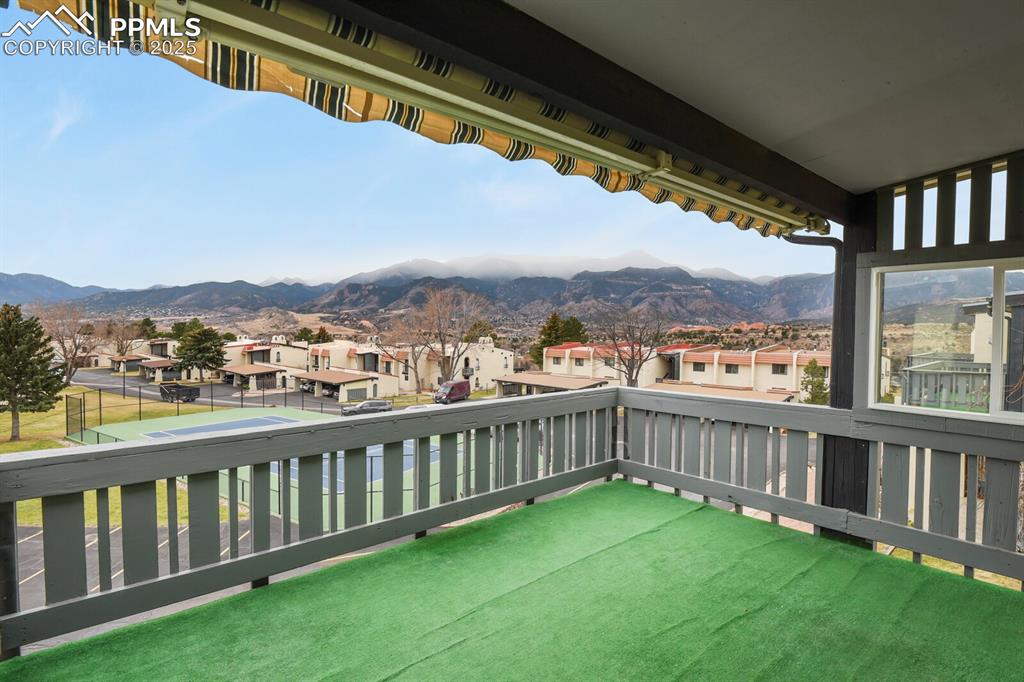 1122 Fontmore Road, Unit C Colorado Springs, CO 80904 - Photo 25 of 31 a view of a balcony with an ocean view