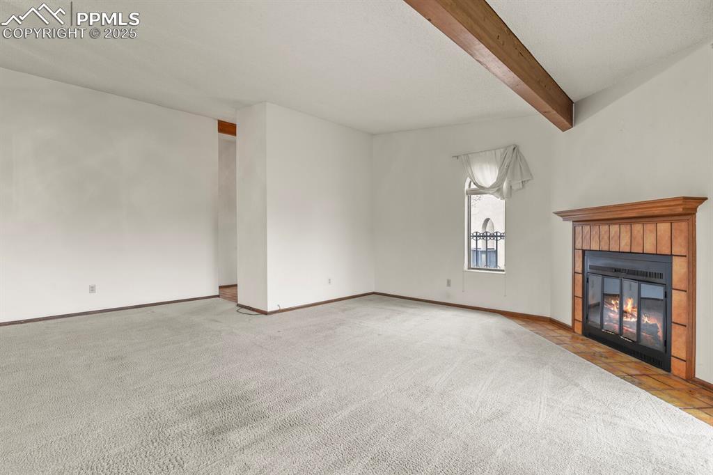 1122 Fontmore Road, Unit C Colorado Springs, CO 80904 - Photo 6 of 31 an empty room with windows