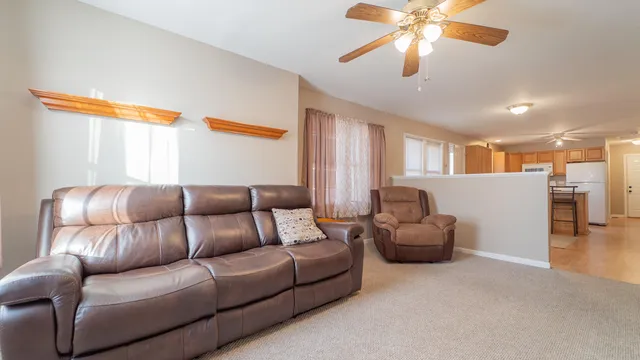 a living room with furniture and a window